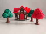 Casa 3D estilo isleño – 25 cm con árboles y puerta que se abre
