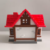 Casa 3D estilo isleño – 25 cm con árboles y puerta que se abre